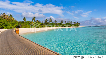 Radiant tropical Maldives pier extending over turquoise ocean calm beach serene sunset summer vacation exotic island paradise Radiant tropical Maldives pier extending over turquoise ocean calm beach serene sunset summer vacation exotic island paradise 137721674