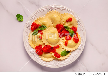 Ravioli with tomato sauce and basil Ravioli with tomato sauce and basil 137722461