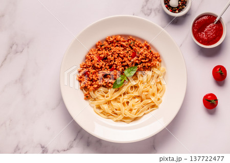 Vegan Bolognese Pasta with plant based minced meat. Vegan Bolognese Pasta with plant based minced meat. 137722477