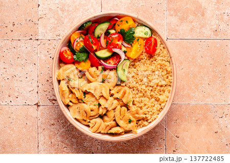 Bowl of quinoa with vegan soy meat and vegetables. Bowl of quinoa with vegan soy meat and vegetables. 137722485