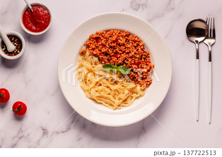 Vegan Bolognese Pasta with plant based minced meat. Vegan Bolognese Pasta with plant based minced meat. 137722513