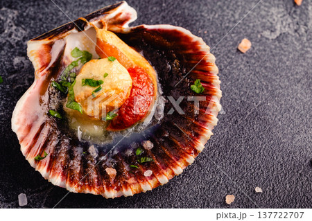 Cooked scallops with parsley Cooked scallops with parsley 137722707