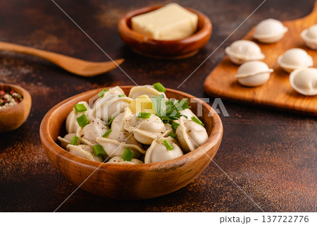 Homemade meat dumplings - russian pelmeni. Homemade meat dumplings - russian pelmeni. 137722776