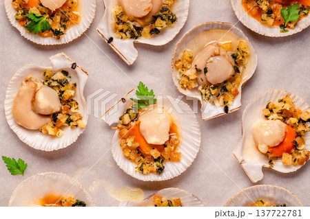 Cooked scallops with sauce Cooked scallops with sauce 137722781