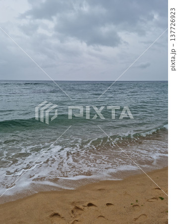 It is a seascape full of dark clouds. It is a seascape full of dark clouds. 137726923