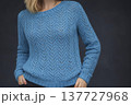 A girl wearing colorful knitwear. Fashionable design, modeling sample. 137727968