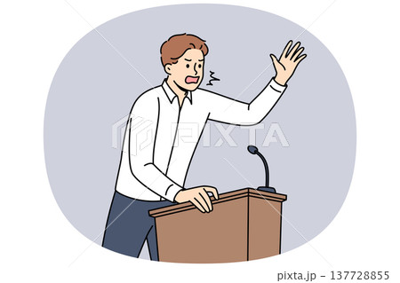 Fiery politician shouts into microphone, standing behind podium and expressing far-right ideas 137728855