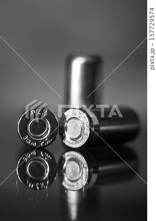 View of three pistol bullets in black and white View of three pistol bullets in black and white 137729574