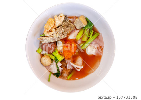 Top view of Yentafo Pink seafood flat noodles with fish meatballs, focus selective Top view of Yentafo Pink seafood flat noodles with fish meatballs, focus selective 137731308