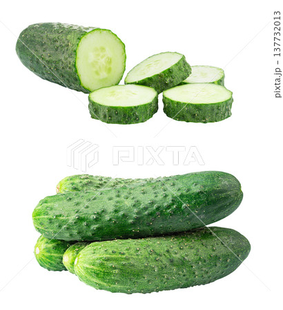 Set of fresh green cucumbers, whole and sliced, isolated on white background. Set of fresh green cucumbers, whole and sliced, isolated on white background. 137732013