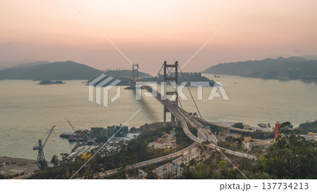 Iconic Suspension Bridge Illuminated At Sunset Over Tranquil Waters Feb 21 2026 Iconic Suspension Bridge Illuminated At Sunset Over Tranquil Waters Feb 21 2026 137734213
