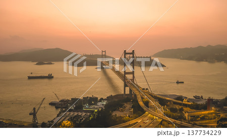 Iconic Suspension Bridge Illuminated At Sunset Over Tranquil Waters Feb 21 2026 Iconic Suspension Bridge Illuminated At Sunset Over Tranquil Waters Feb 21 2026 137734229