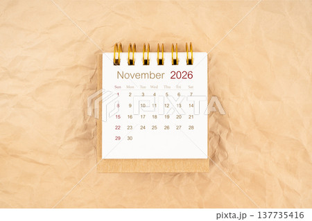 November 2026 mini desk calendar on old paper. November 2026 mini desk calendar on old paper. 137735416