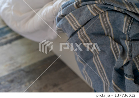 White blanket with dirty duvet cover removed for washing White blanket with dirty duvet cover removed for washing 137736012