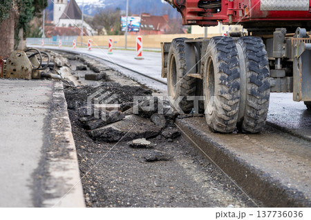 View of removed asphalt on a section of highway in the city 137736036