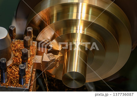 High-precision finishing process of brass material parts on a lathe machine to achieve a superior surface quality. 137736087