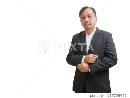 Confident Businessman Standing with Authority on White Background Confident Businessman Standing with Authority on White Background 137739451