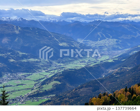 View of the valley among the Alpine mountains covered with snow 137739664