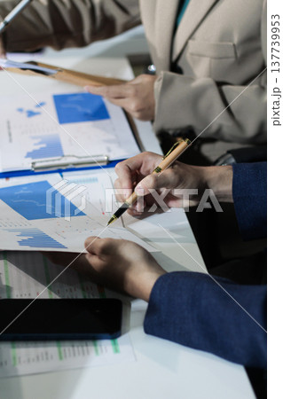 Business woman accountant working in office checking financial accounts and allocating company budgets. Business woman accountant working in office checking financial accounts and allocating company budgets. 137739953