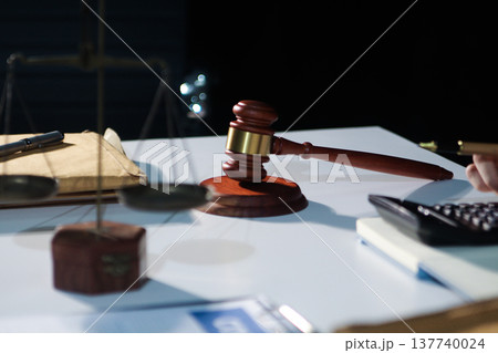 Consultation and conference of professional businesswoman and Male lawyers working and discussion having at law firm in office. Concepts of law, Judge gavel with scales of justice Consultation and conference of professional businesswoman and Male lawyers working and discussion having at law firm in office. Concepts of law, Judge gavel with scales of justice 137740024