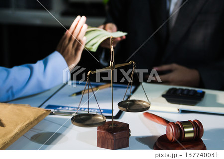 Consultation and conference of professional businesswoman and Male lawyers working and discussion having at law firm in office. Concepts of law, Judge gavel with scales of justice 137740031