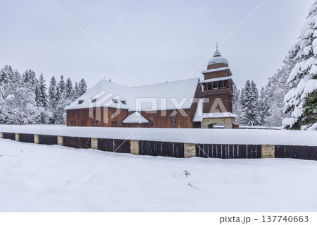 Wooden Articular Church standing in winter snow Svaty Kriz Slovakia Wooden Articular Church standing in winter snow Svaty Kriz Slovakia 137740663