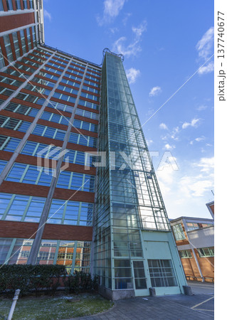 Zlin building showcasing functionalist architecture and modern glass facade 137740677