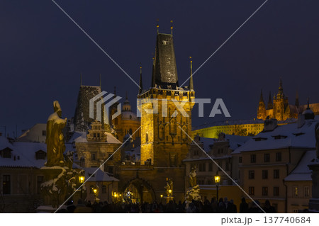 Charles Bridge Lesser Town Bridge Tower illuminating snowy night Charles Bridge Lesser Town Bridge Tower illuminating snowy night 137740684