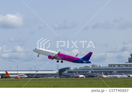 Passenger plane taking off at PRAGUE Ruzyne Airport Passenger plane taking off at PRAGUE Ruzyne Airport 137740887