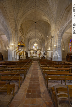 Church interior with pews and vaulted ceiling in Auvillar Church interior with pews and vaulted ceiling in Auvillar 137740907