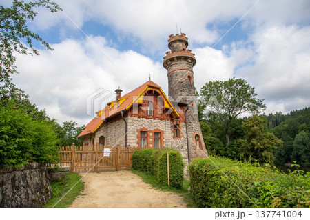 Les Kralovstvi dam historic stone reservoir with towers and bridge in forest landscape in Czech Republic 137741004