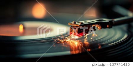 Turntable needle creating sparks on spinning vinyl record. Turntable needle creating sparks while playing a spinning vinyl record, capturing music and energy Turntable needle creating sparks on spinning vinyl record. Turntable needle creating sparks while playing a spinning vinyl record, capturing music and energy 137741430