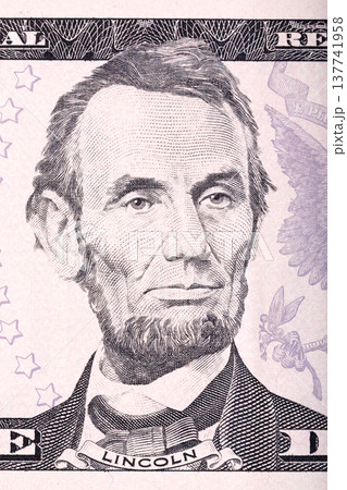 Abraham Lincoln portrait from five dollars bill. 137741958
