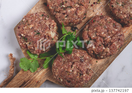 raw cutlets, minced meat, on a chopping board, homemade, top view, no people, raw cutlets, minced meat, on a chopping board, homemade, top view, no people, 137742197