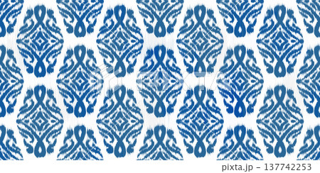 Ikat seamless blue floral pattern with geometric abstract ornament. Traditional decorative woven illustration. Vector grunge textured oriental rug motif background. Ikat seamless blue floral pattern with geometric abstract ornament. Traditional decorative woven illustration. Vector grunge textured oriental rug motif background. 137742253