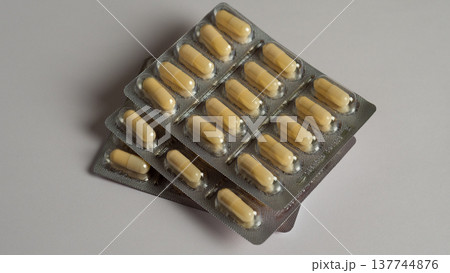 Magnesium vitamins MG in a blister on a white background 137744876