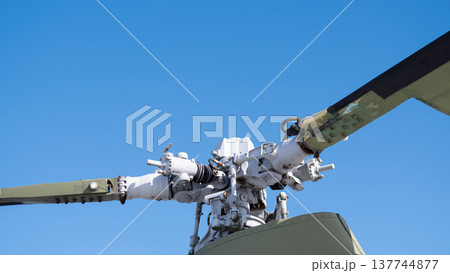 Rotor Assembly Detail Against Clear Sky, Closeup Of Swashplate Linkage And Gearbox, Metallic Textures, Bolts And Bearings, Precision Engineering Vibe, Maintenance And Inspection Narrative, 137744877