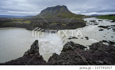 Huge cascade waterfall with big mountain in background, Iceland Huge cascade waterfall with big mountain in background, Iceland 137745057