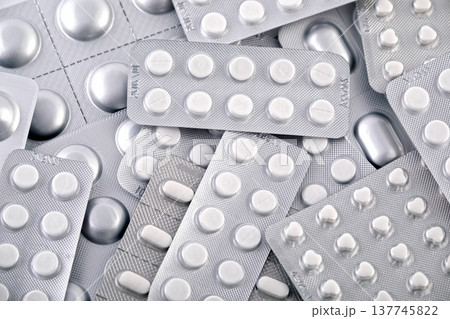 Big heap of many various pills and tablets packs and blisters Big heap of many various pills and tablets packs and blisters 137745822