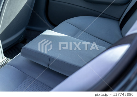 Experience the elegance of a contemporary car interior, showcasing soft seats and refined details, perfect for any journey 137745880