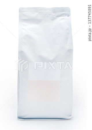 vertical view of sealed packages for bulk products with empty labels on them, for 1 kilogram, or 1000 gram, on a white background, isolated 137745891