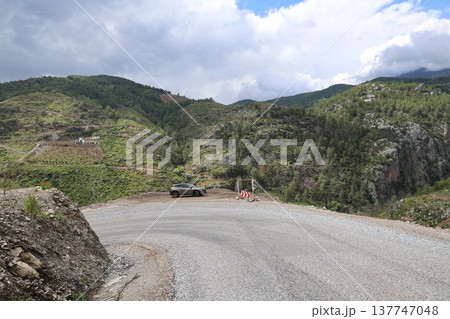 Mountain road car.Mountainous arid landscape. High quality photo Mountain road car.Mountainous arid landscape. High quality photo 137747048