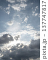 Beautiful image of blue sky with clouds and bright sun. 137747817