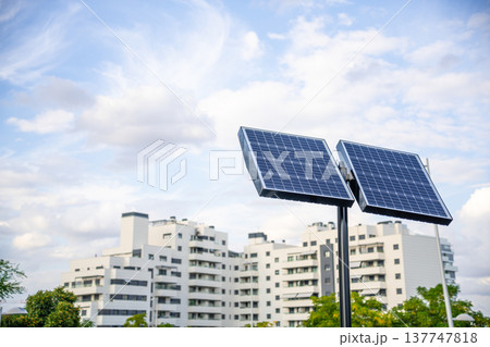 Solar Panel in Modern Residential City with a clear sky background Solar Panel in Modern Residential City with a clear sky background 137747818