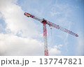Image of a Work Crane in a Construction with the background of shiny sky 137747821