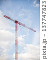 Image of a Work Crane in a Construction with the background of shiny sky 137747823