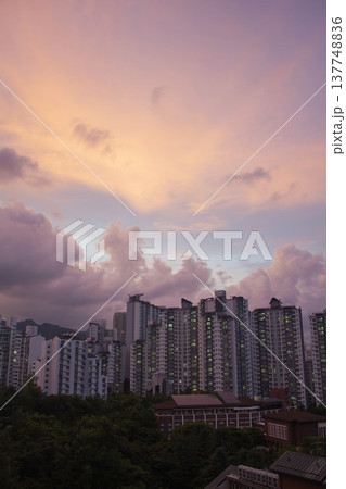 It's a beautiful sunset and apartment scenery. It's a beautiful sunset and apartment scenery. 137748836