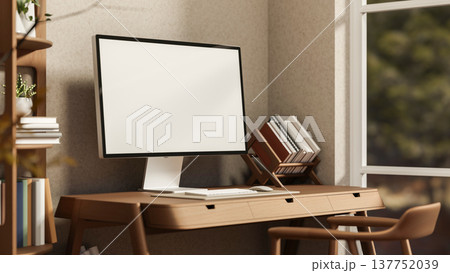 White screen computer and book rack on wooden table aside shelf and glass window in a room's corner. White screen computer and book rack on wooden table aside shelf and glass window in a room's corner. 137752039