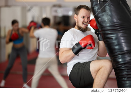 Man in Muay Thai training Man in Muay Thai training 137752404