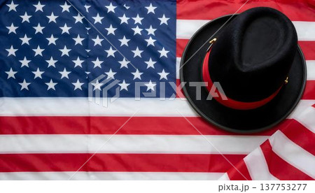 A hat paired with a Scottish flag, celebrating Scottish American Heritage Month set against a colorful background 137753277